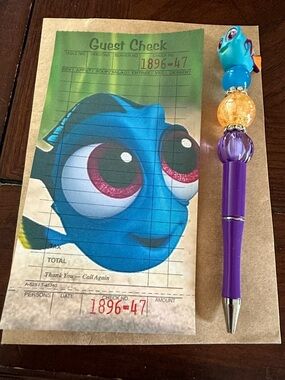 Handmade Disney Doorable Dory beaded pen and Guest Check Print Colorful